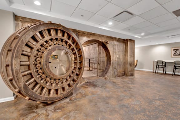 a large mechanical fan in a room with a table and chairs at Metro67, Memphis, TN