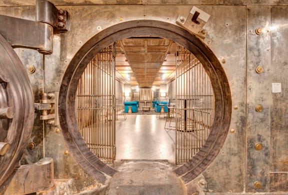 a circular doorway in a building with metal doors and gates  at Metro67, Memphis, TN