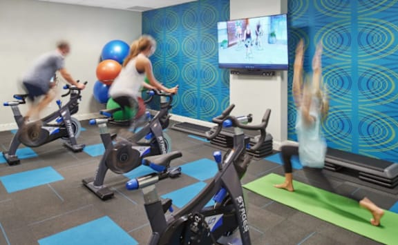 people working out in a gym on exercise bikes at Metro67, Memphis, TN
