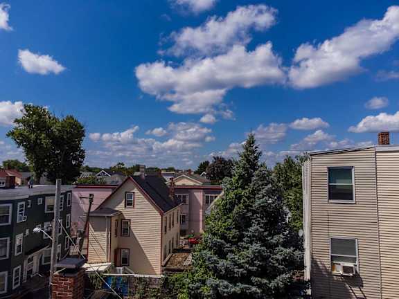 an aerial view of a neighborhood with houses and trees at Union 346, Somerville, Massachusetts, 02143