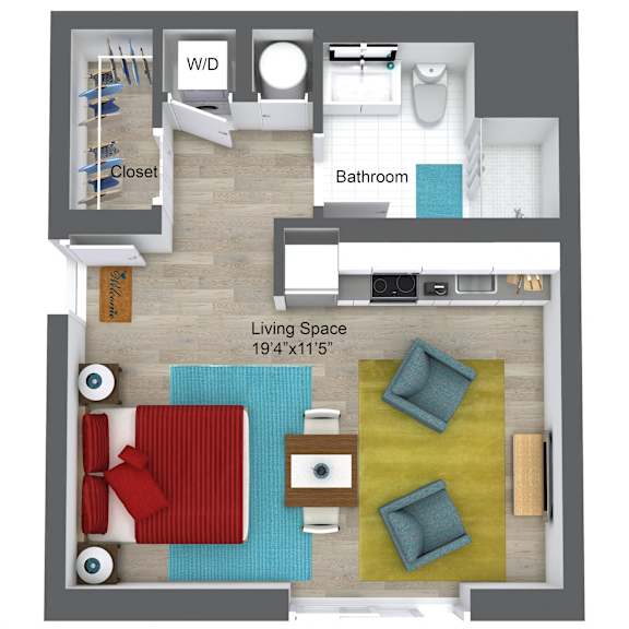 A living space with a couch, chair, and ottoman.