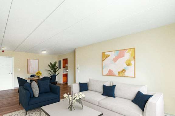 A living room with a blue couch and a white couch	at Edmands House, Framingham, 01701
