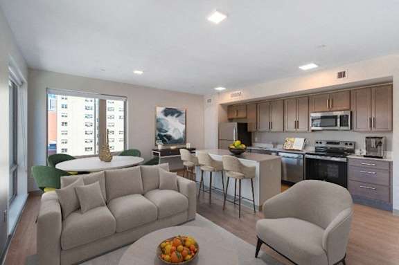 A modern living room with a couch, chair, and a kitchen area in the background at Pok Oi Residences, Boston, MA, Massachusetts, 2111