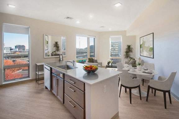 A modern kitchen with a view of the city at Pok Oi Residences, Boston, MA, Massachusetts, 2111