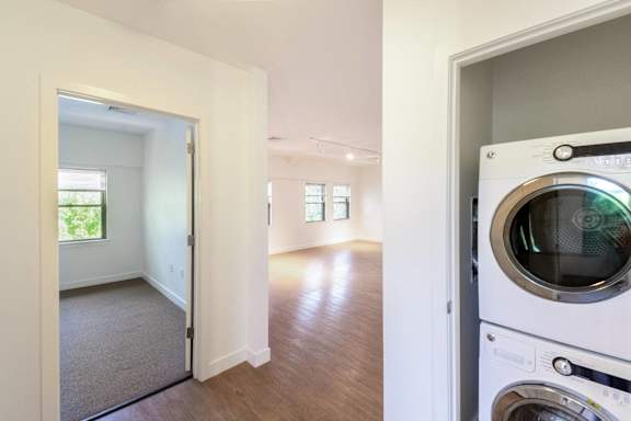 a laundry room with a washer and a dryer in a house at Ames Shovel Works Apartments, Massachusetts, 02356