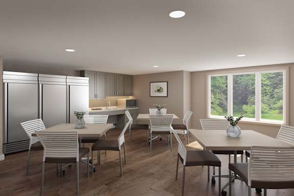 A modern dining room with a large table and chairs.