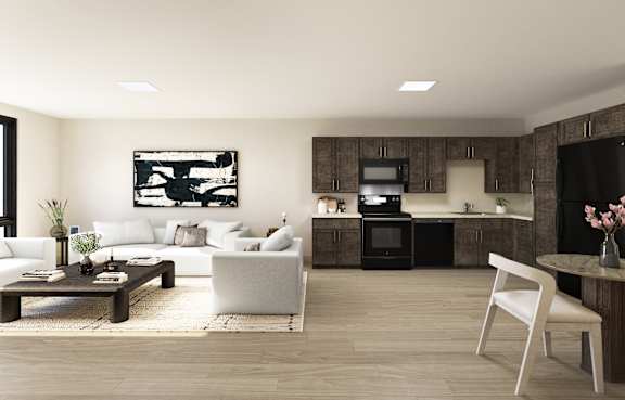 A modern living room with a white sofa, a wooden coffee table, and a white chair.