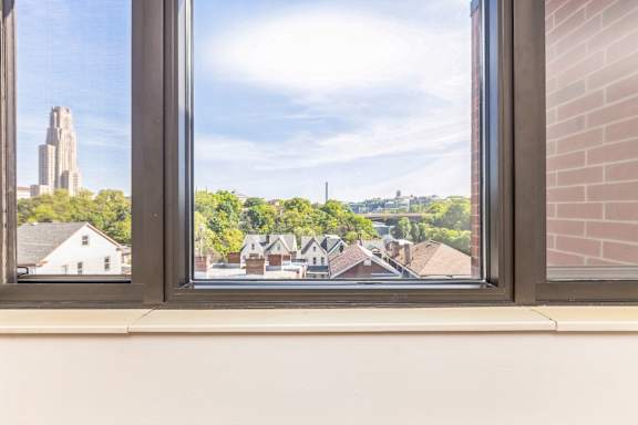 A view of a residential area through a window.