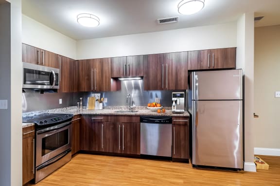 Modern Kitchen with Stainless Steel Appliances at Wilber School Apartments, Sharon