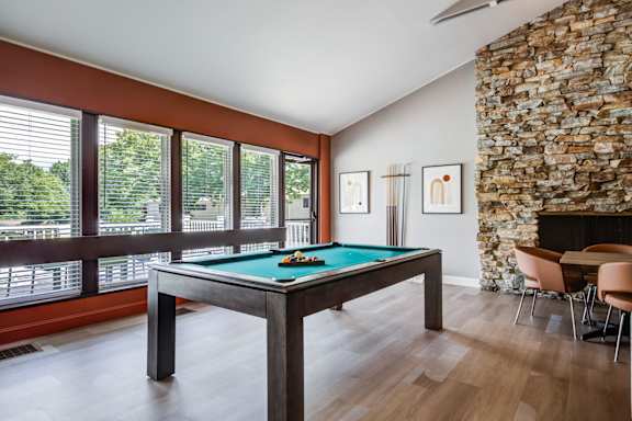 Clubhouse with Great Room for Resident Functions - with Fireplace, Large-Screen TV, & Kitchen at Williamsburg Estates, Harrisburg, PA, 17112
