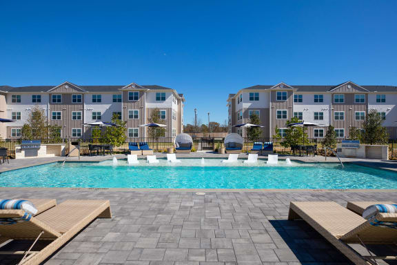 take a dip in our resort style swimming pool at 55 Fifty at Northwest Crossing, Houston, TX