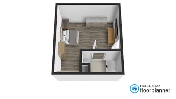 A floor plan of a small apartment with a bedroom, living room, and kitchen.