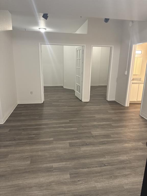 Open living room with wood-style flooring in Olympia WA 2-bedroom apartment home