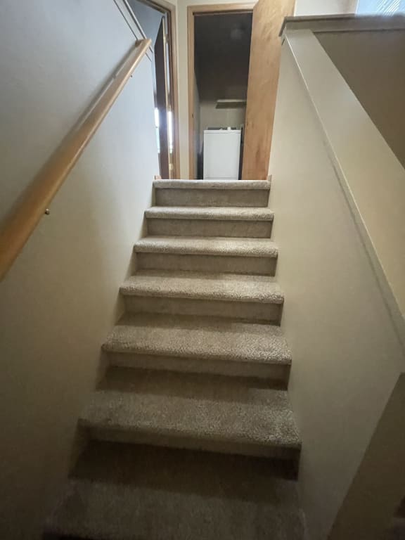 a row of concrete pillars in the middle of a room