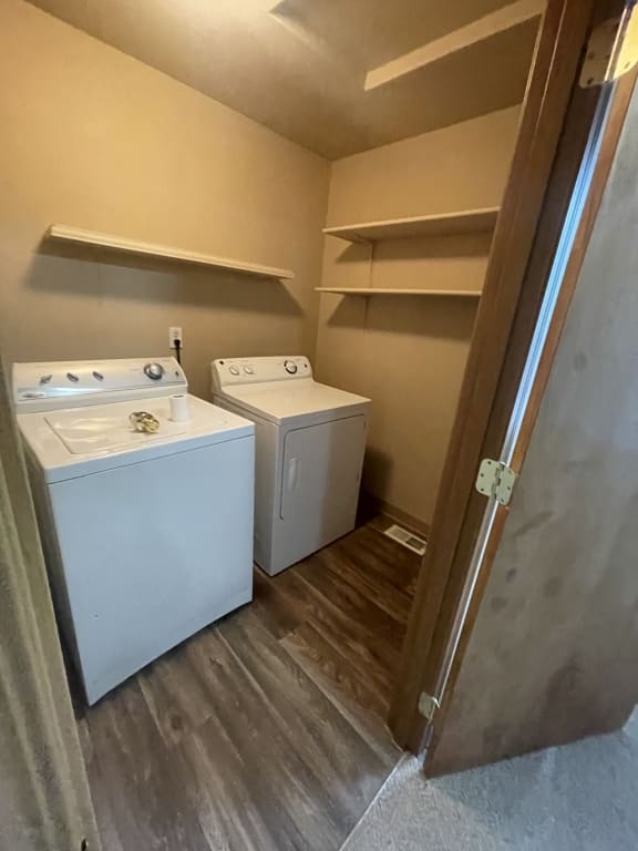 an overhead view of a room with a refrigerator and a sink