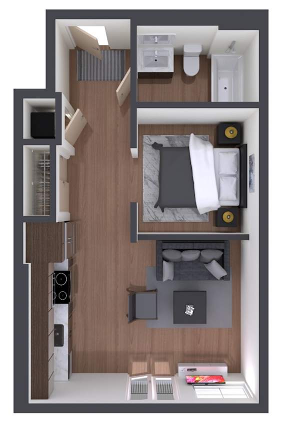A top down view of a small apartment with a bed, desk, and kitchenette.