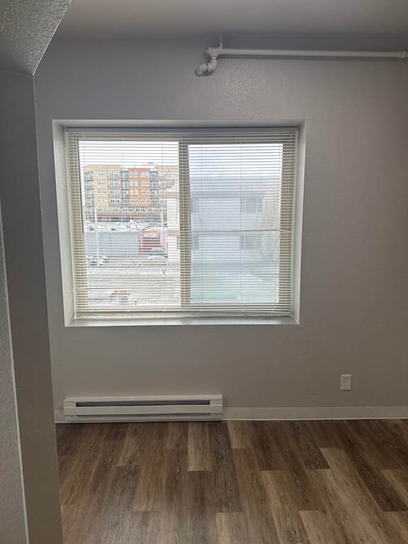 A window with a view of a cityscape.