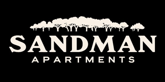 The image is a logo for Sandman Apartments, featuring a row of trees above the text.