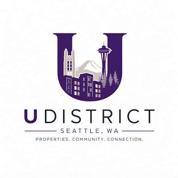 A logo for U District Seattle, Washington, featuring a stylized letter U with a city skyline and a mountain in the background.
