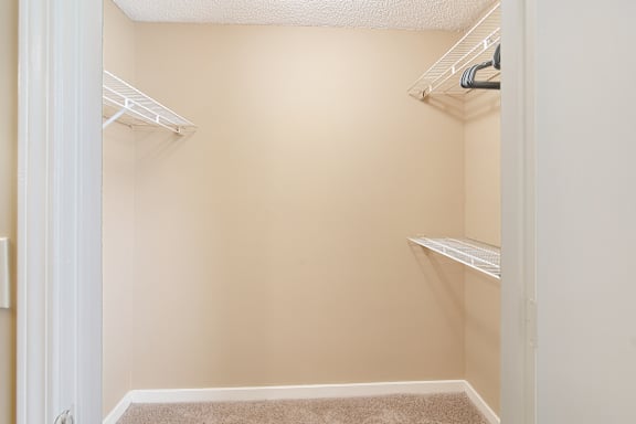 Walk-in closet at The Colony Apartment Homes in Columbus, MS