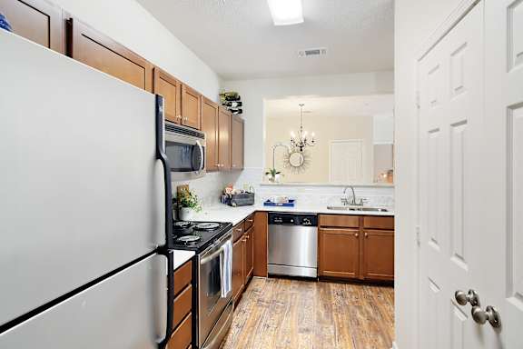 Stainless steel appliances in kitchen at Landing at Willow Bayou Apartment Homes in Bossier City, LA