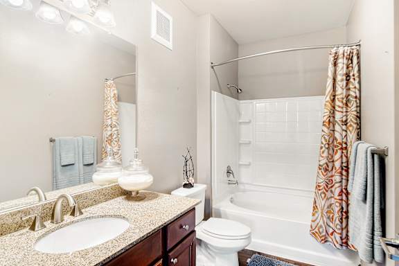 Designer Granite Countertops In All Bathrooms at Wellington Grande Apartment Homes, Longview, TX, Texas