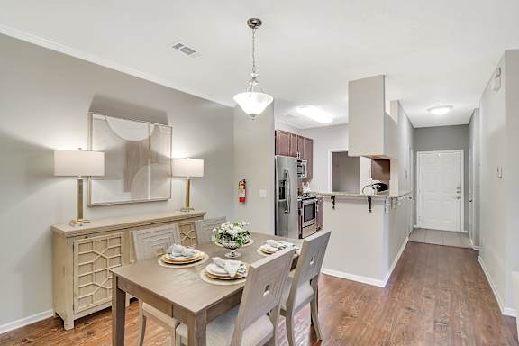Hardwood flooring in dining room at Ashford Place Apartment Homes, Flowood