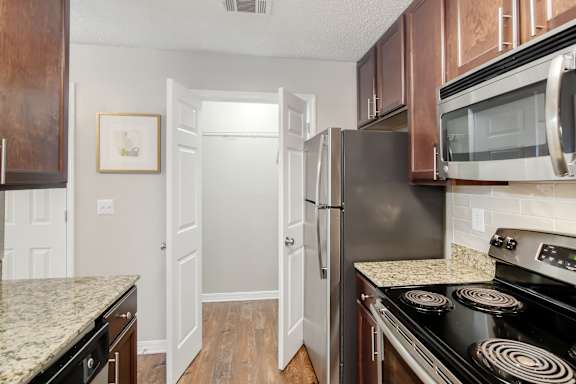 Stainless steel appliances at Lakeshore Pointe Apartment Homes in Brandon, MS
