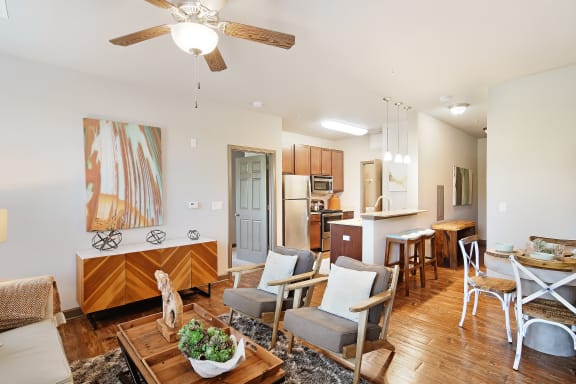 a kitchen with stainless steel appliances and a marble counter top at Audubon Park Apartment Homes, Louisiana