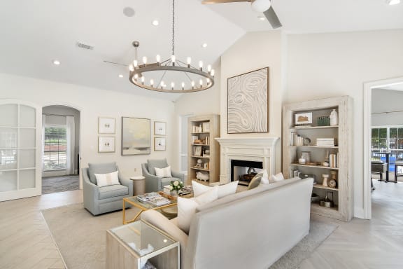 a living room with couches and chairs and a table at Bridgewater Apartment Homes, Brandon, Mississippi
