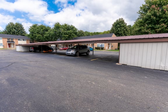 a parking lot with a car in front of a building