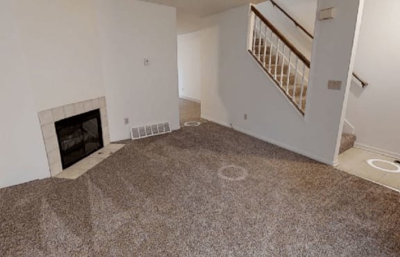 Living Room with Fireplace at Arbor Pointe Townhomes, Michigan