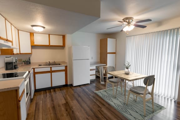 Kitchen with Ceiling Fan at Arbor Pointe Townhomes, Battle Creek, Michigan, 49037