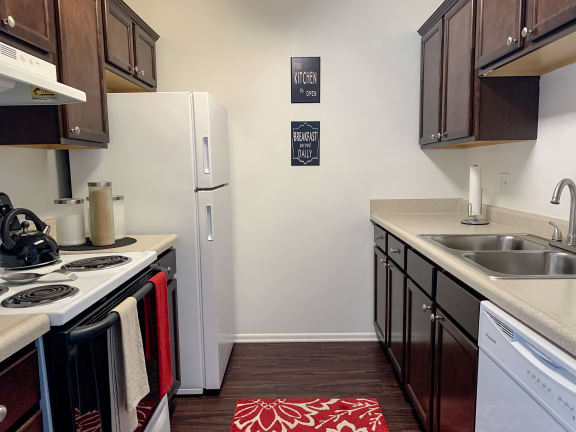 Newly Remodeled Apartments with Galley Kitchen at The Lodge Apartments in Indianapolis, IN 46205