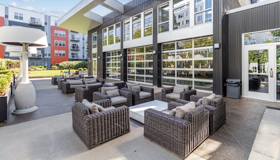 the lobby of a building with couches and chairs at Bakery Living in Pittsburgh, PA 15206