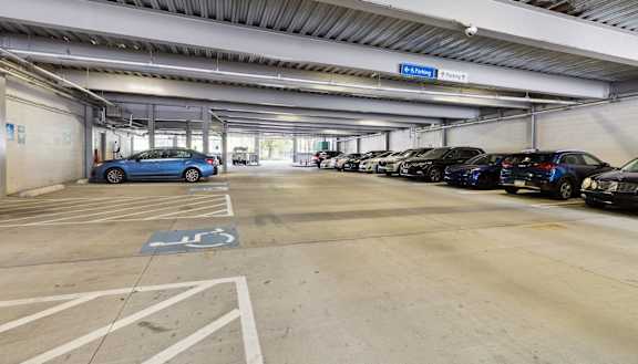 a parking garage with cars parked in it