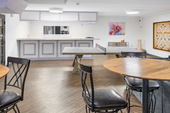 A room with a table and chairs in it. at Walnut Crossings, Monroeville, PA, 15146