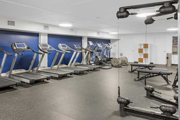 A gym with treadmills and weight machines. at Walnut Crossings, Monroeville, PA, 15146