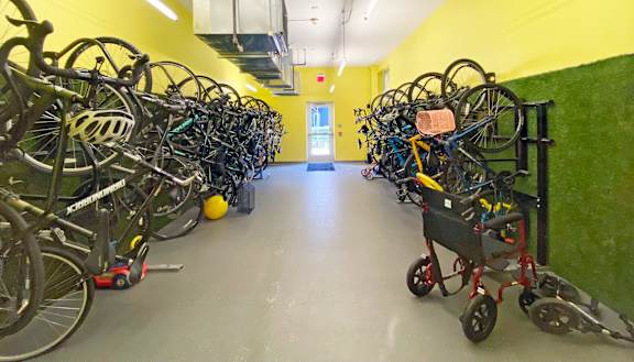 a room filled with lots of bikes and a stroller at Bakery Living, Shadyside, Pittsburgh, PA 15206