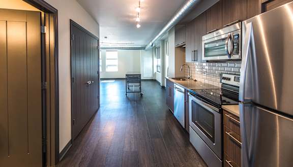 a kitchen and living room at Walnut on Highland, Pennsylvania 15206