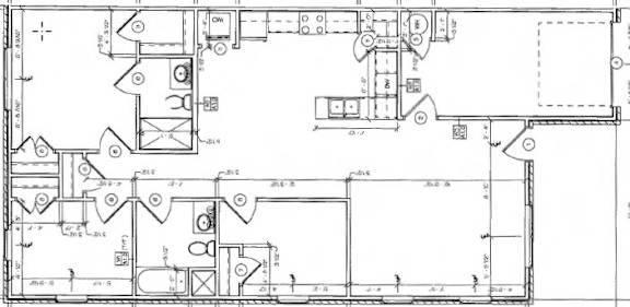 A black and white architectural floor plan with various rooms and measurements.