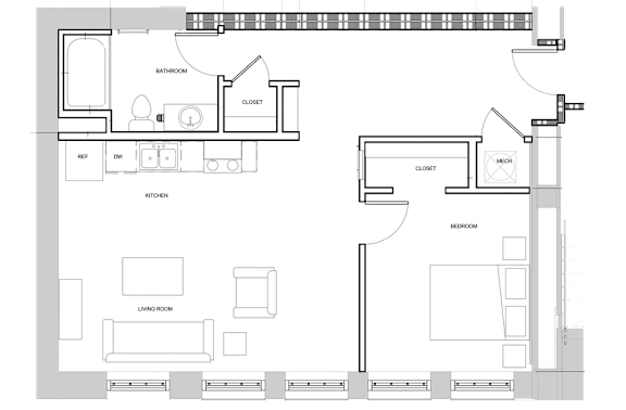A floor plan of a house with a living room, kitchen, and two bedrooms.