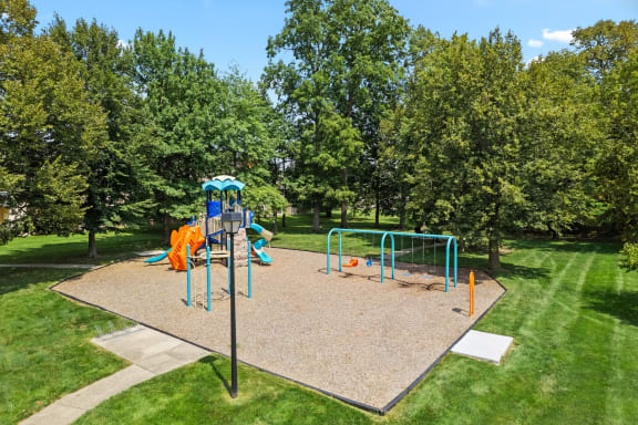 the playground at the flats at big tex apartments