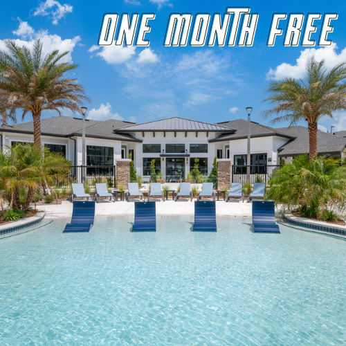 a house with a swimming pool in front of it and the words one month free
