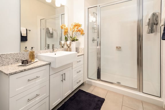 Bathroom with cabinet at Solara Apartments, Sanford, FL