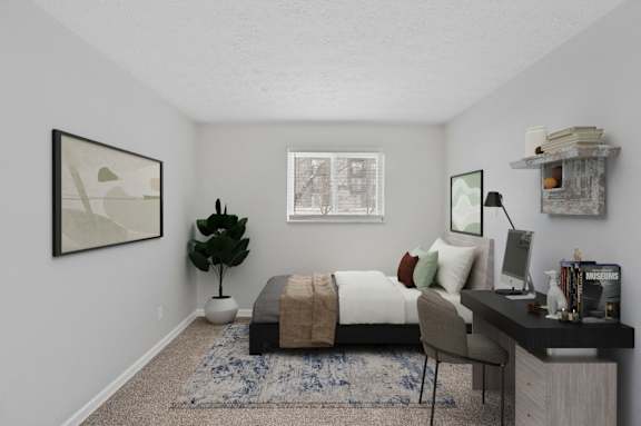 A bedroom with a bed, desk, chair, and a plant.