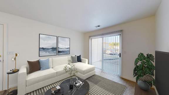 A living room with a white couch and a coffee table.