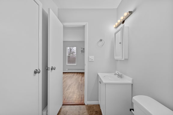 a bathroom with a sink and a mirror at Cincinnati Premier Living*, Cincinnati