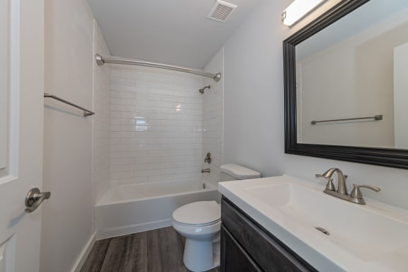 an empty bathroom with a sink toilet and shower at Ivy Hills Living Spaces, Ohio, 45244