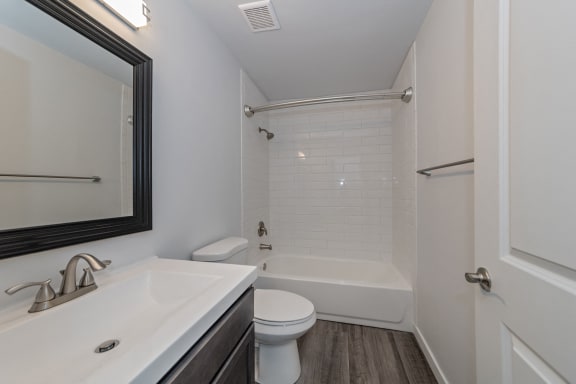 an empty bathroom with a sink toilet and shower at Ivy Hills Living Spaces, Cincinnati, 45244